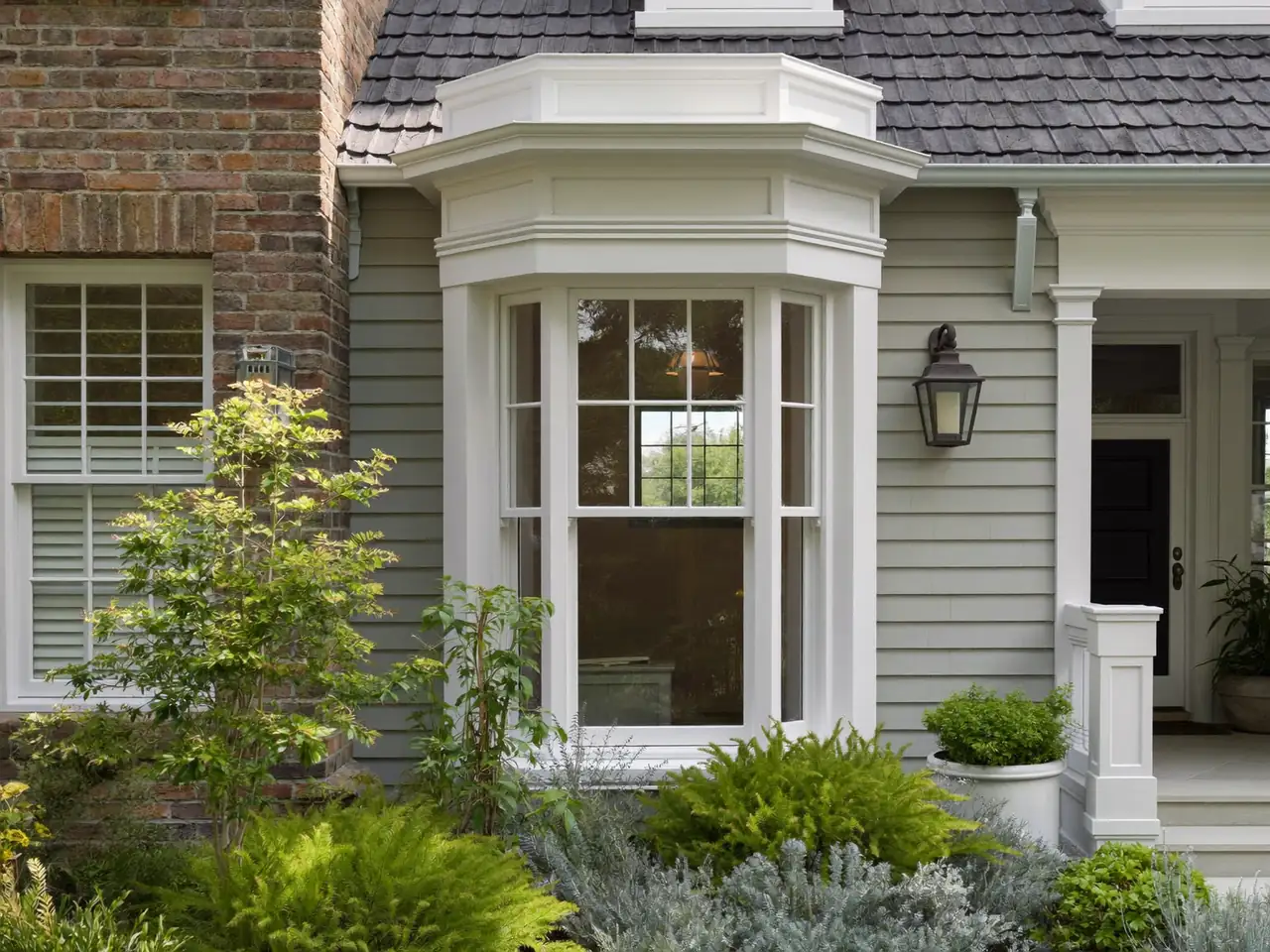 New bay window on a renovated period home from the street